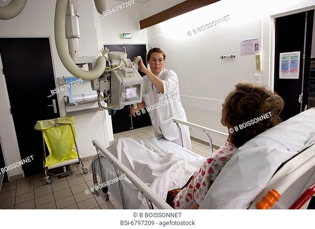 Photo essay at the hospital of Meaux, France. Department of medical imagery. Operator with a patient