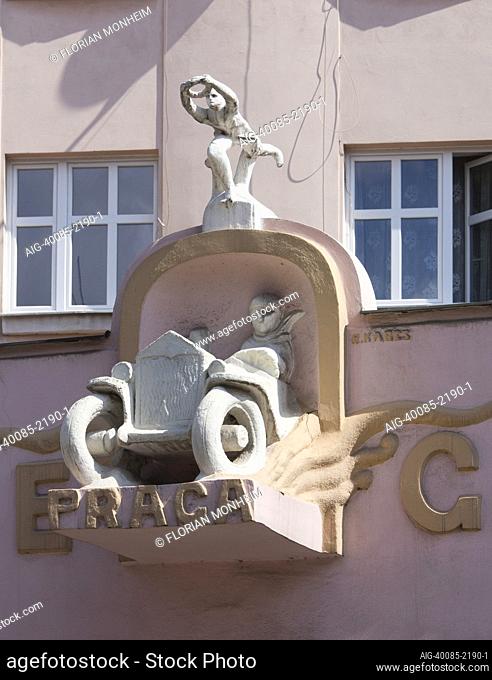 Detail of decorative car relief on Praga Garage, Tabor, Bohemia, Czech Republic
