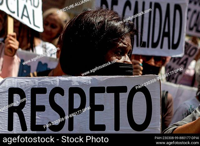 08 March 2023, Venezuela, Caracas: A woman demands ""respect"" at a rally on International Women's Day. Photo: Jesus Vargas/dpa. - Caracas/Venezuela