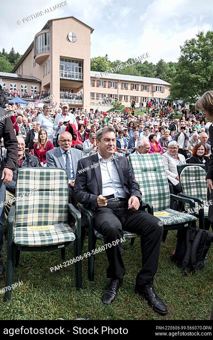 06 June 2022, Bavaria, Gerolfingen: Markus Söder (CSU), Minister President of the Free State of Bavaria, follows the Bavarian Kirchentag