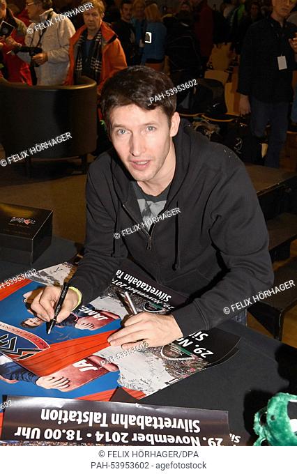 British singer James Blunt signs posters before a concert in the mountains of the Tyrolean ski resort Ischgl,  Austria, 29 November 2014