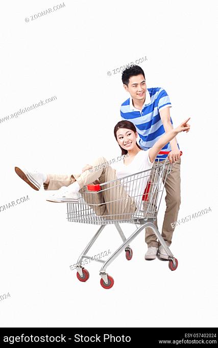 A happy young couple are Grocery shopping high quality photo