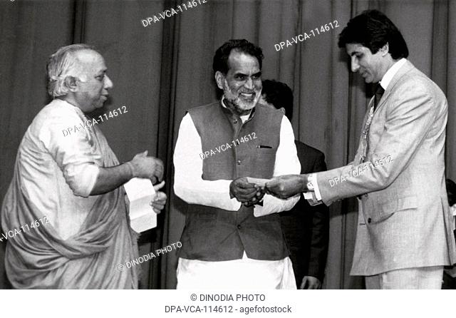 South Asian Indian industrialist R p goenka , former PM Chandrashekhar with Bollywood actor Amitabh Bachchan , Delhi , India NO MR