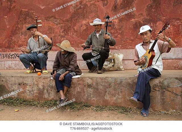 traditional Chinese street musicians performing at the Chaoyang Gate in Jianshui in Yunnan China