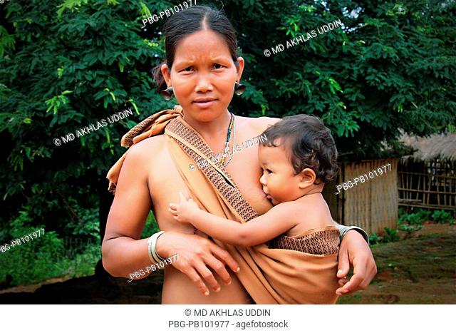 A Murang tribe woman brest feeds her child Bandarban, Bangladesh September 2009