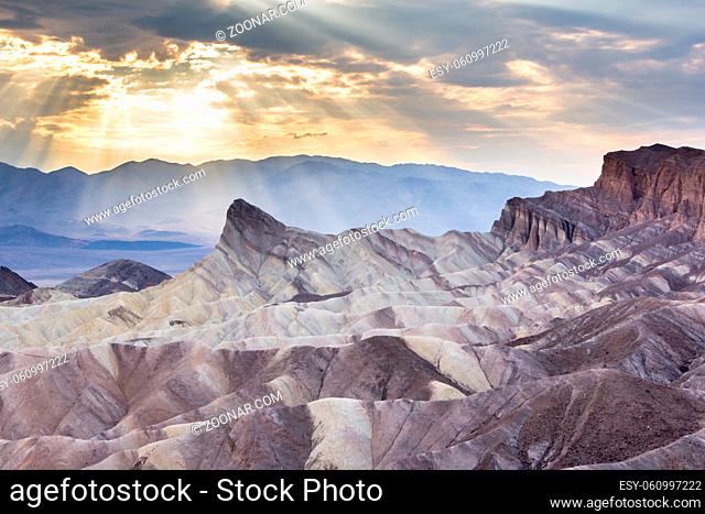 Sunset at Zabriskie point in Death Valley national park Eastern California in the northern Mojave Desert. One of the hotest places on earth
