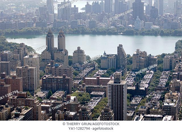 Aerial view of Upper West/East side, and reservoir J. Kennedy in Central park, during heatwave in hot summer, Manhattan, New York city, USA