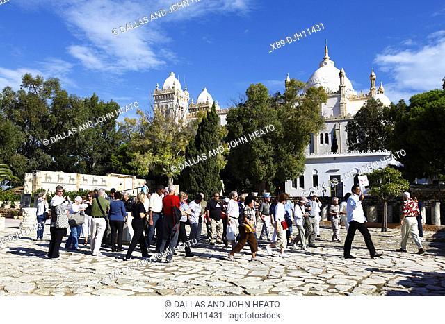 Africa, Tunisia, Tunis, Carthage, Byrsa Hill, St. Louis Cathedral, Sightseers among Punic Ruins
