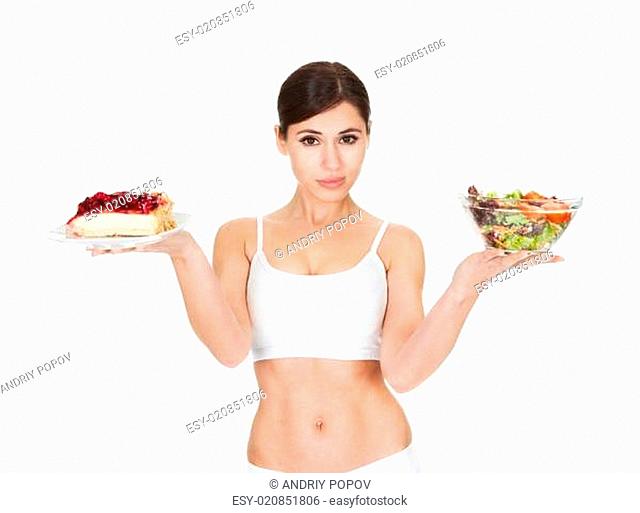Young Woman Holding Cake And Salad