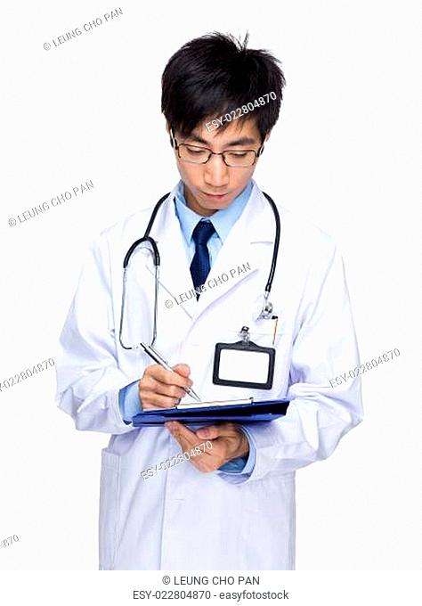 Medical doctor write on clipboard