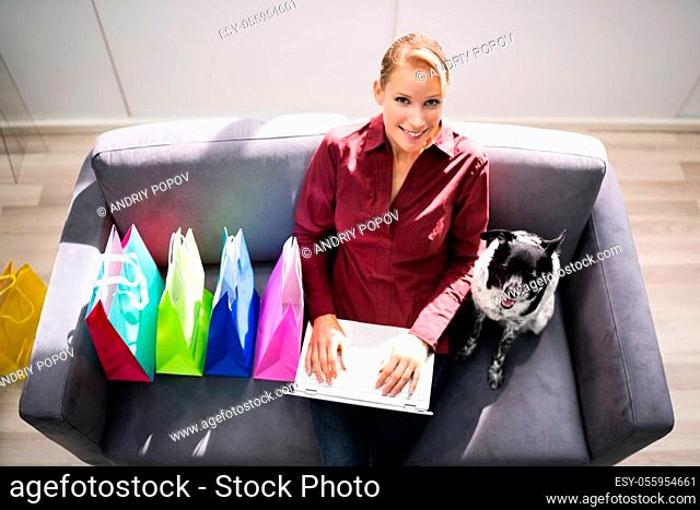 Ecommerce Online Shopping On Sofa Using Laptop