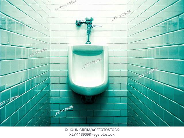 Urinal in men's restroom