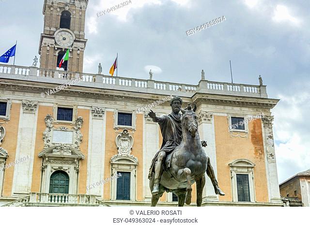 the bronze equestrian statue of Marco Aurelio (Marcus Aurelius) with the Campidoglio Palace in the distance in Rome