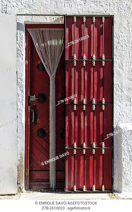 A wooden door view in Carboneras town, Almería province, Spain
