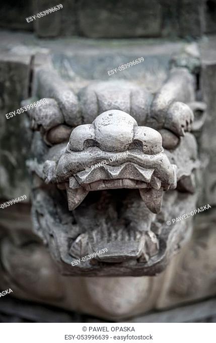 Lion head sculpture figure in the courtyard of the Wenshu Monastery, Chengdu, China