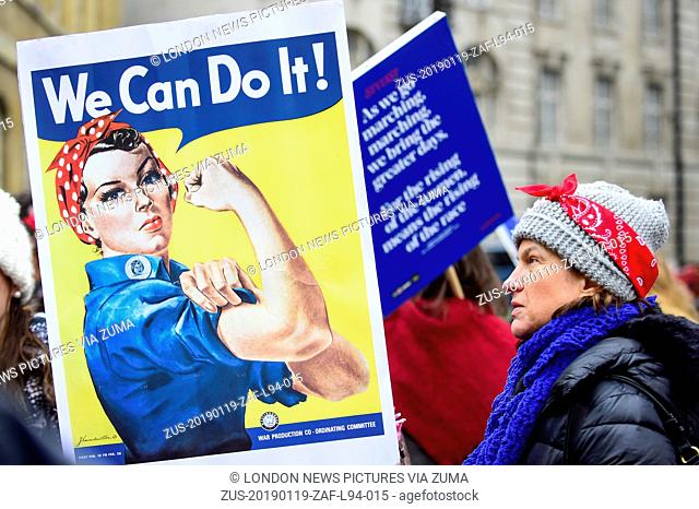 January 19, 2019 - London, UK - LONDON, UK. A woman holds up a We Can Do It sign joining thousands of participants in the Women's March in the capital