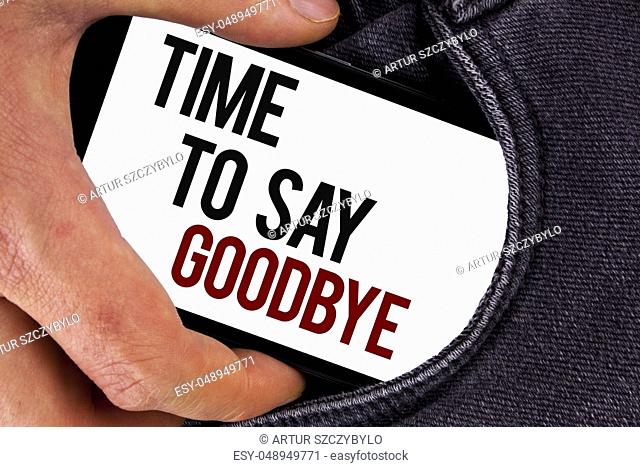 Handwriting text Time To Say Goodbye. Concept meaning Separation Moment Leaving Breakup Farewell Wishes Ending written Mobile Screen holding in the Hand Jeans...