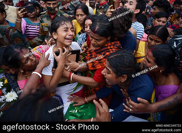 Family members mourn the death of Army Soldier Prashanta Deb, who was killed in a landslide in Noney district of Manipur. Agartala. Tripura, India