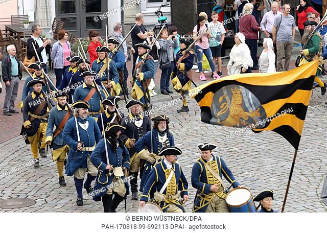 Reenactors of Swedish Carolean troops marching to a camp mass in Wismar, Germany, 18 August 2017. The Hanseatic city ofÂ Wismar conmemorates with the Sweden...