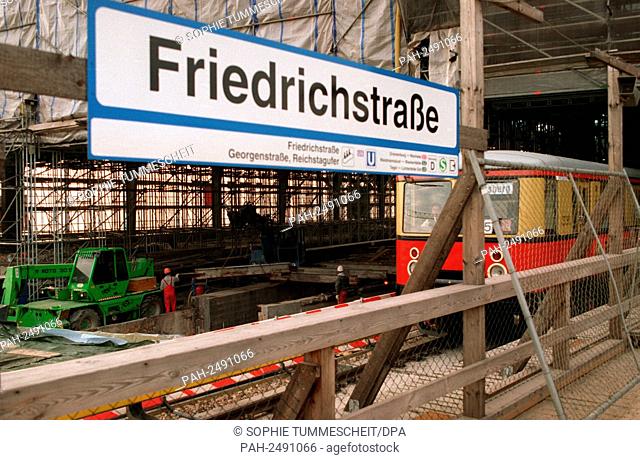 covered with blueprints and provisional wooden shutters shows the station Friedrichstrasse on January 13, 1998 in Berlin