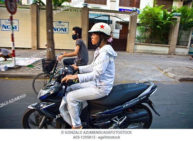 People in motorbike. Ho Chi Minh City (formerly Saigon). South Vietnam