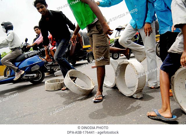 Sikhs blocking highway protesting for dera saccha sauda at ; Mulund ; Bombay ; Mumbai  ; Maharashtra  ; India NOMR