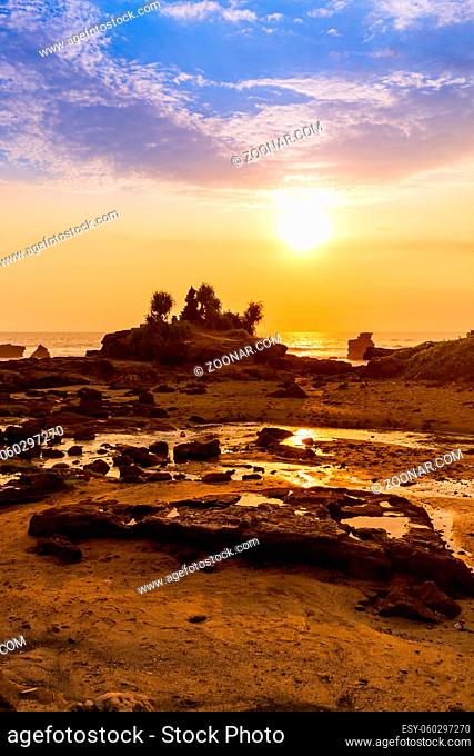 Beach near Tanah Lot Temple in Bali Indonesia - travel background