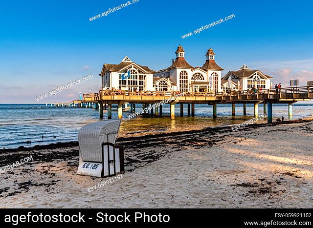 Sellin, Mecklenburg-Western Pomerania, Germany - September 30, 2020: A Beach Chair on the Main Beach and The Sellin Pier