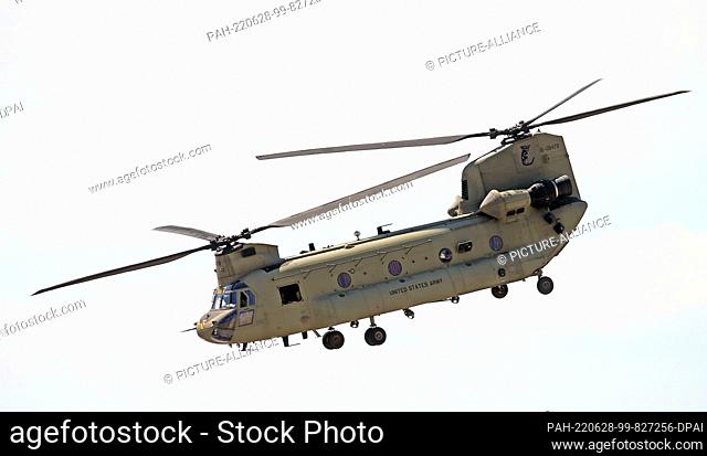 20 June 2022, Brandenburg, Schönefeld: The Boeing CH-47 Chinook flies on the grounds of the International Aerospace Exhibition ILA