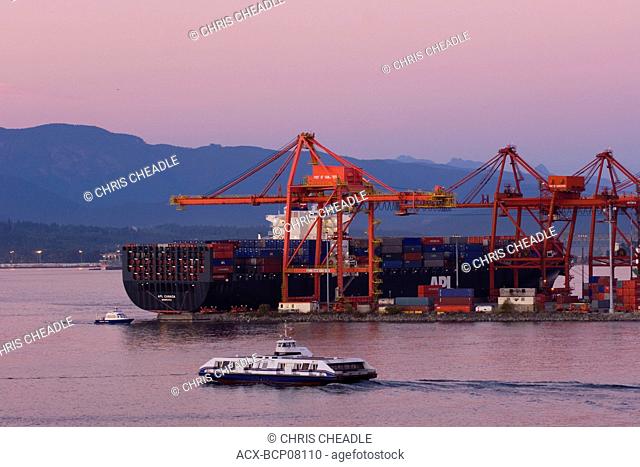Port of Vancouver and freighter at dusk, British Columbia, Canada