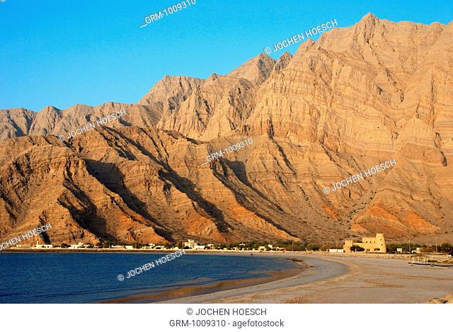 Coast on Musandam with Bukha fort, Oman