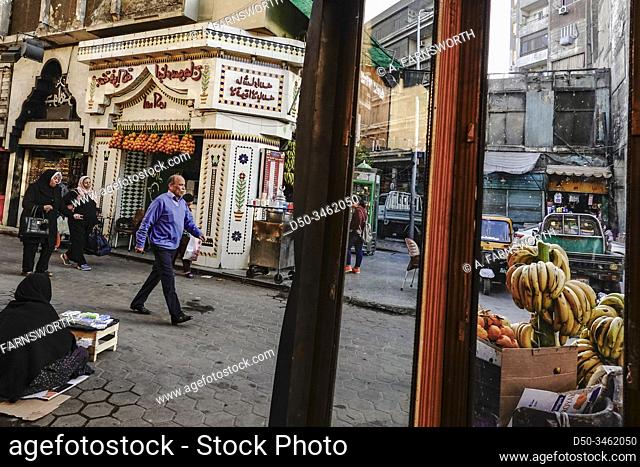 Cairo, Egypt Pedestrians in the busy Khan el-Khalili bazaar reflected in a mirror