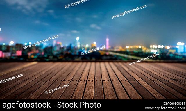 wooden platform and lights of night, guangzhou china