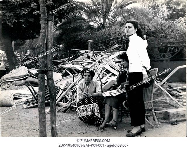 Sep. 09, 1954 - Scenes of the Earthquake in Algeria: French residents of Orleansville camp cut in the garden. The woman in the chair cries bitterly