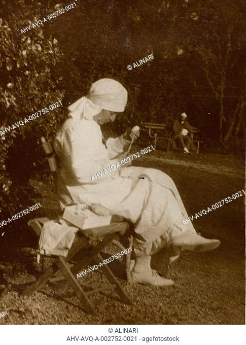 Album of the First World War in Friuli-Venezia Giulia: portrait of a Red Cross nurse in the park of Villa Brazzà, home to 17 of the Hospital of war in...