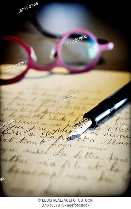 old handwritten letter postmarked, pen stylographic and glasses