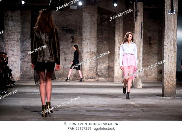 Models present fashion by Bobby Kolade during an offsite show of the Mercedes-Benz Fashion Week at the Berghain club in Berlin, Germany, 20 January 2015