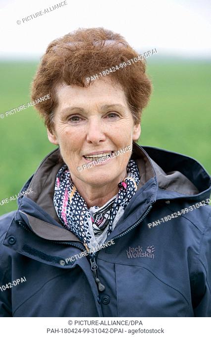 24 April 2018,  Germany, Alt-Negentin: Margit Nagel, head of the Plant Protection Service of Greifswald, photographed on rape field
