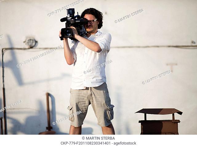 Cameraman with camera TV, news, journalism, video, recoring, record Sony camera, red light CTK Photo/Martin Sterba, Rene Fluger