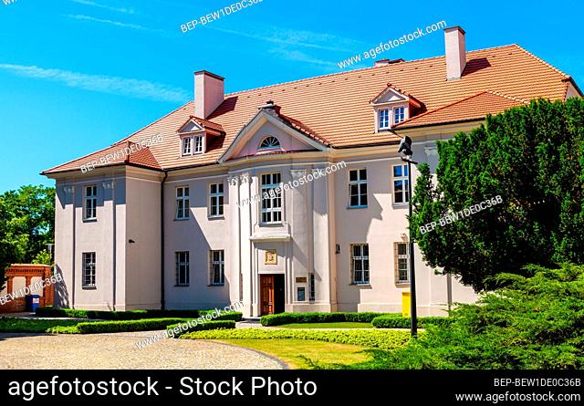 Poznan, Poland - June 5, 2015: Poznan Metropolitan Curia residence aside cathedral of St. Peter and St. Paul on historic Ostrow Tumski island at Cybina river