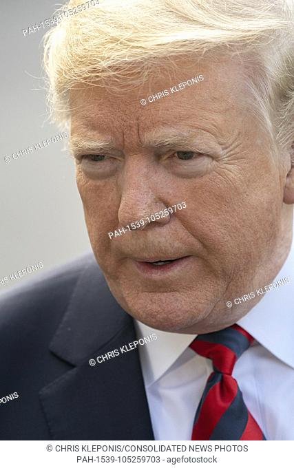 United States President Donald J. Trump seeks to the media before departing the White House in Washington, DC to attend the G-7 meeting in Canada, June 8, 2018