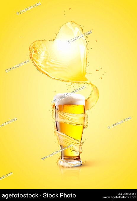 Big heart splash of light amber beer above full glass of fresh beverage with thick foam on a light yelow background, copy space