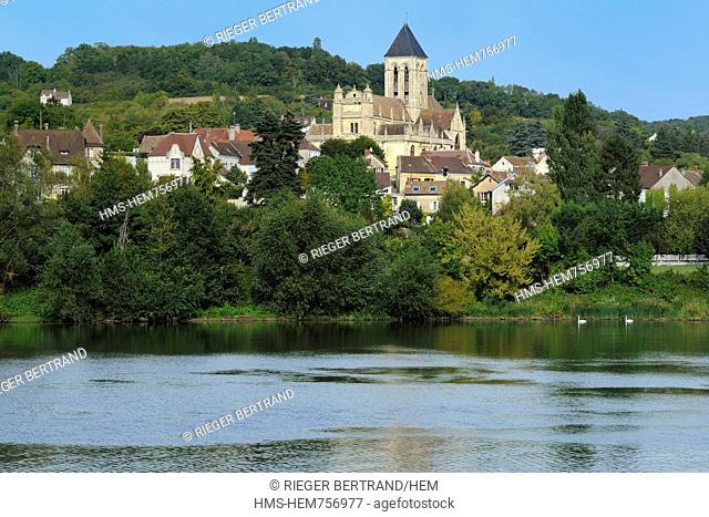 France, Val-d'Oise, Vetheuil village and its Notre Dame church painted by Claude Monet overlooking the Seine river