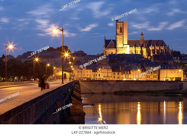Evening over the old town of Nevers, Saint Cyr et Sainte Julitte Cathedral in the background, Bridge over the river Loire, The Way of St
