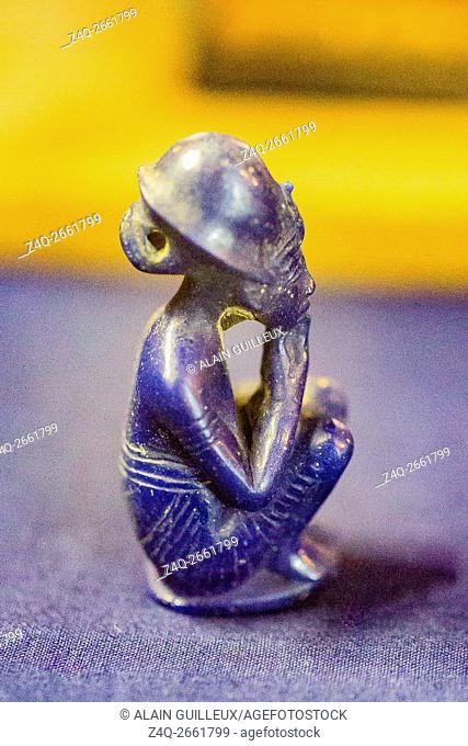 Egypt, Cairo, Egyptian Museum, Tutankhamon jewellery, from his tomb in Luxor : Small squatting figure of a king. Blue glass
