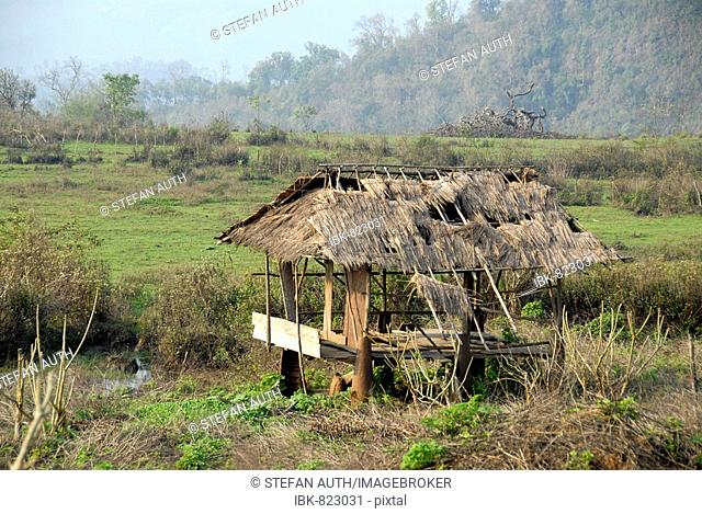 Hut in the rice field with stilts made from bombshells from the Vietnam War, near Phonsavan, Xieng Khuang, Laos, Asia