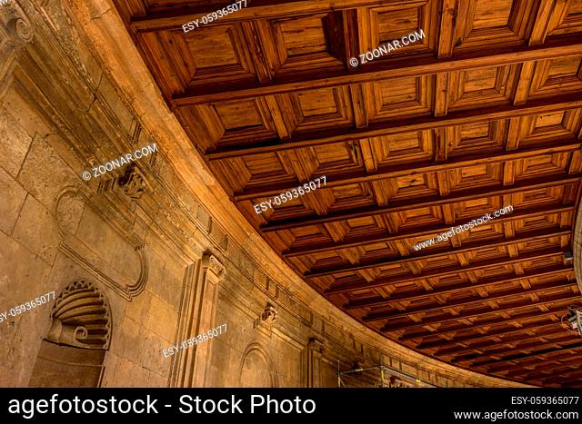 The curver ceiling at the Colosseum, columns and atrium of Alhambra palace, Granada, Spain, Europe on a bright sunny summer day with clear blue sky
