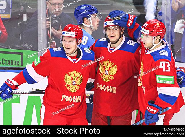 RUSSIA, ST PETERSBURG - DECEMBER 17, 2023: Russia 25's Vasily Glotov, Valentin Zykov, and Artyom Sergeyev (L-R) celebrate scoring in their 2023 Channel One Cup...