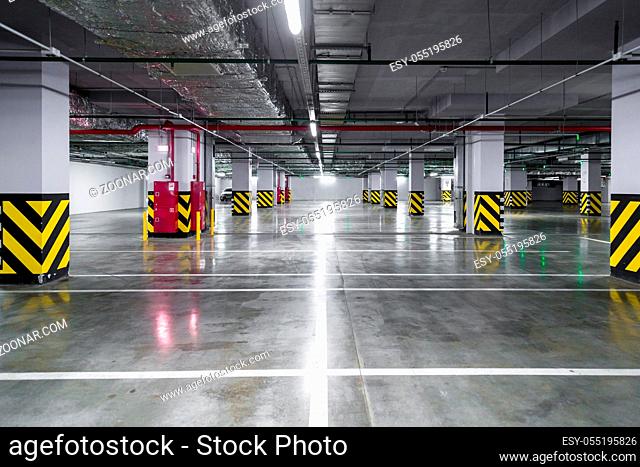 Empty underground parking garage. industrial background