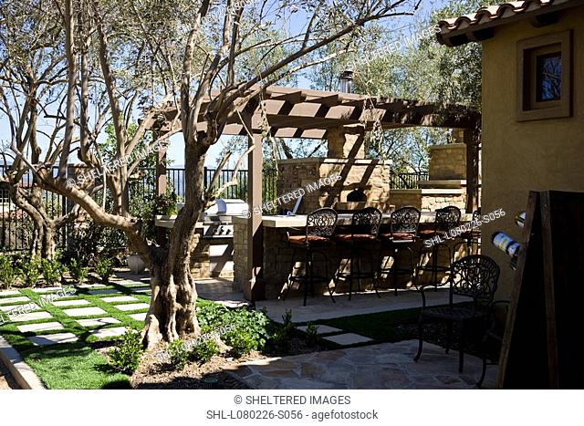 Tuscan Backyard Patio With Grill And Bar Stock Photo Picture And Rights Managed Image Pic Shl L080226 S056 Agefotostock